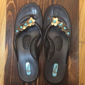 Like new OKA b floral flip flops
